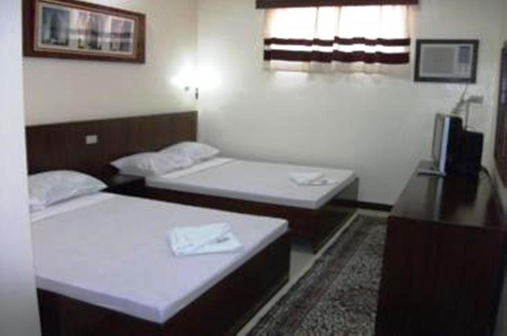 Bed and Breakfast Ysabelle Mansion Puerto Princesa Camera foto