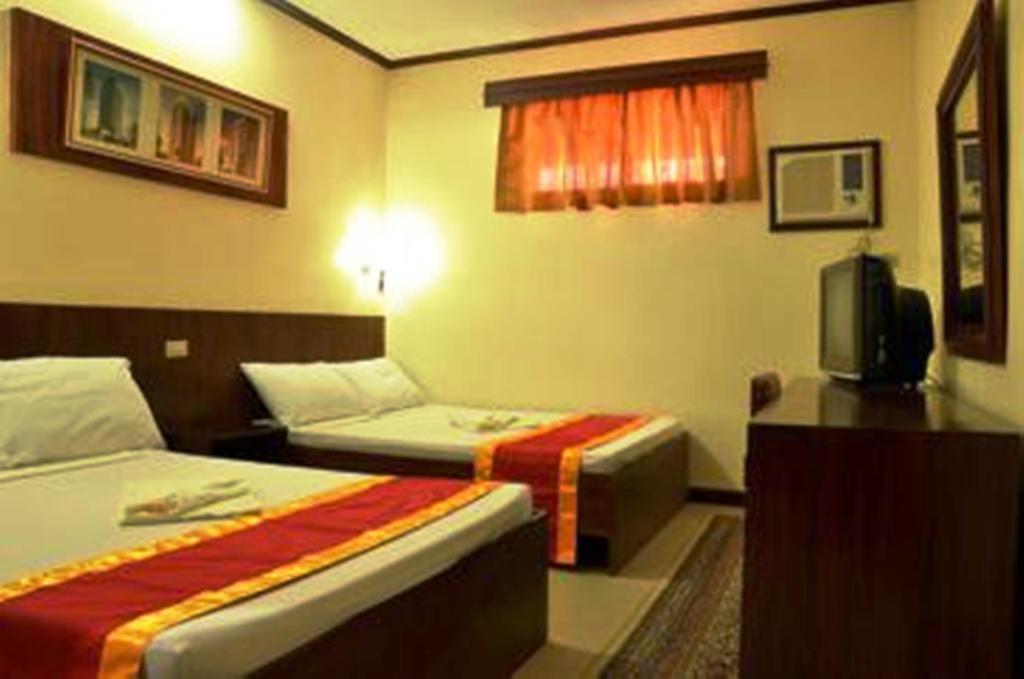 Bed and Breakfast Ysabelle Mansion Puerto Princesa Camera foto